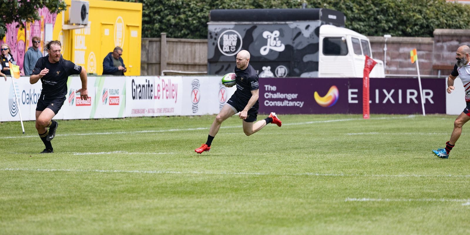Harvey Biljon running with the ball on the launch of his testimonial year